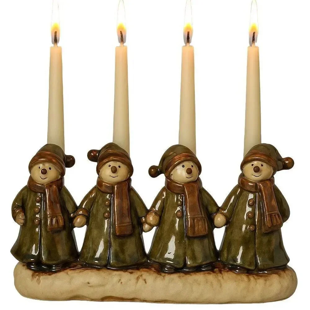 Three Hands Corp snowman candelabra holds 4 candles.